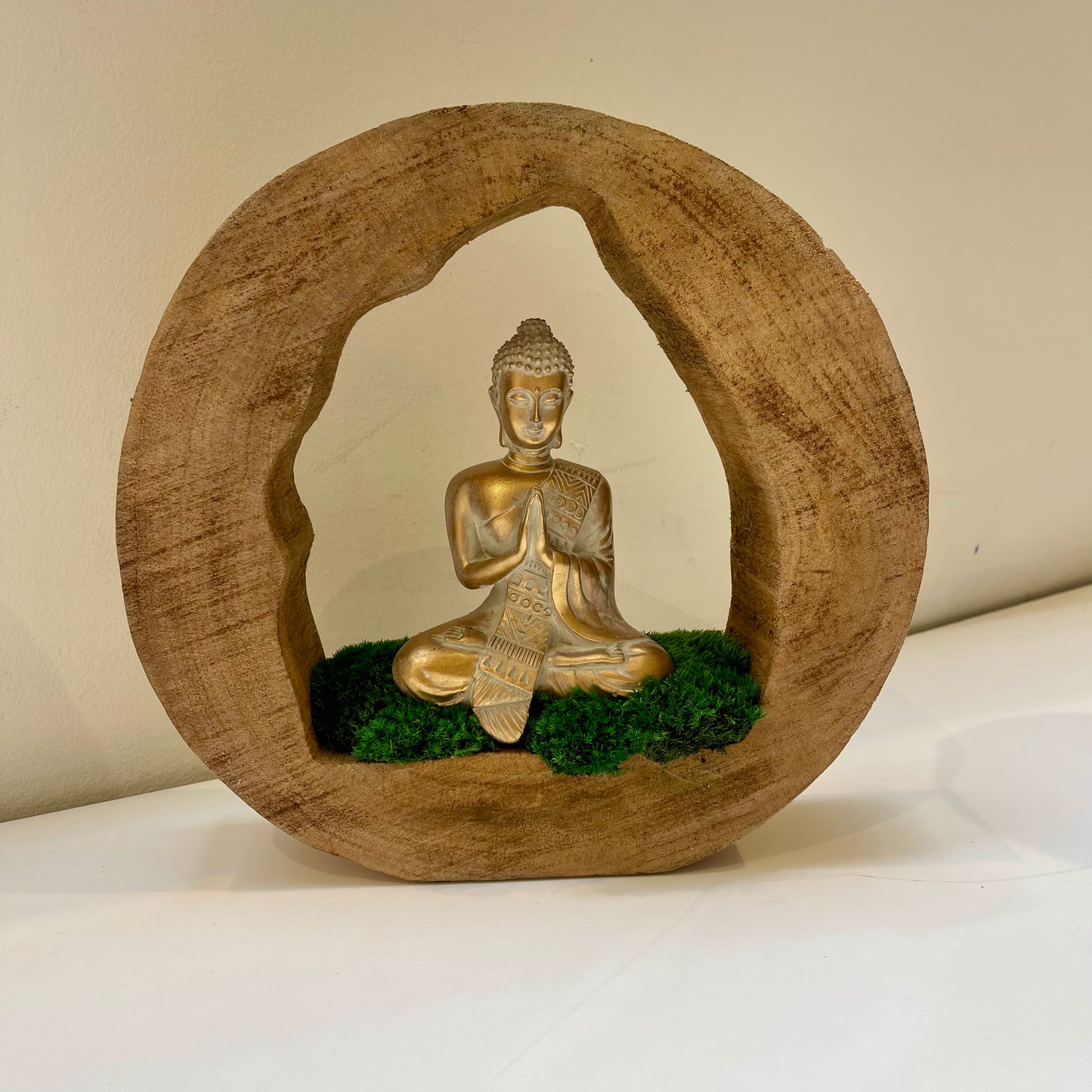Meditating golden Buddha Statue with Moss Sculpture