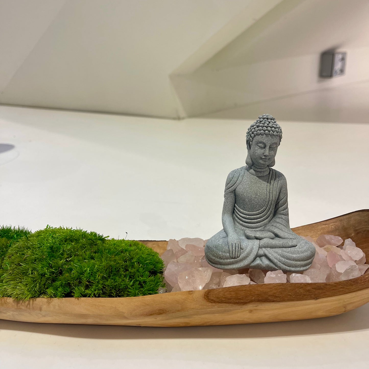 Moss with a Stone Buddha in a Wood