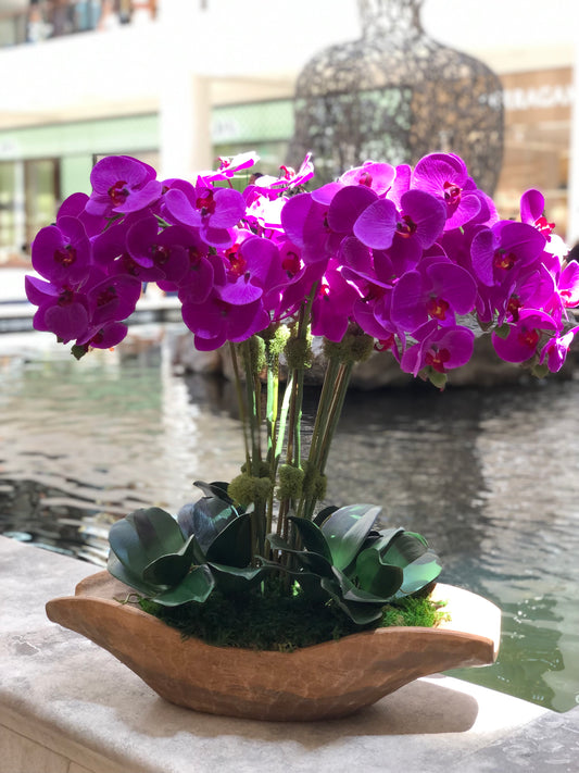 Faux Orchid Flower Composition in wooden base with moss