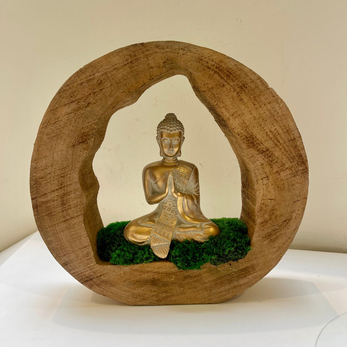 Meditating golden Buddha Statue with Moss Sculpture